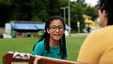 Mother-and-daughter-enjoying-day-at-the-park